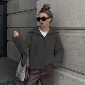 Vintage loose women's knit sweater with quarter-zip V-neck collar and long sleeves