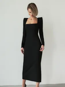 Elegant French Hepburn style little black dress with square neck and long sleeves.