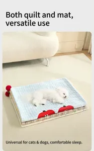 Small white dog sleeping on a blue checkered flannel pet blanket in a cozy room