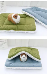 Detail of dual-sided plush pet mat showing corduroy texture and soft fleece lining for hamsters