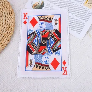 Macro view of a durable crinkle dog toy featuring a King of Diamonds playing card design