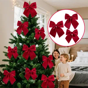 Large red velvet Christmas bows for holiday tree decoration and DIY festive crafts