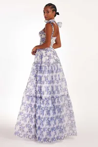 Elegant floral organza long evening dress featuring a tiered skirt and back bow detail