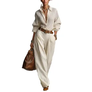 Elegant two-piece cream linen set with long sleeve shirt and wide-leg trousers