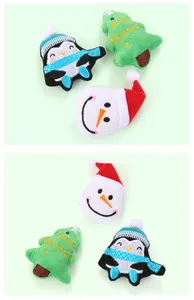Christmas-themed plush catnip toys: penguin, tree, and snowman designs for cats.