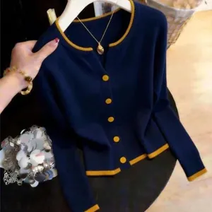 Stylish navy blue knitted cardigan jacket featuring vibrant yellow contrast trim and buttons