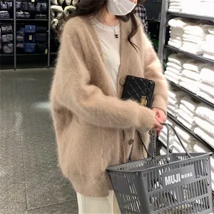Detailed view of a soft beige faux mink mohair oversized cardigan jacket for women