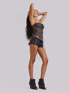 Professional side view detail of a vintage grey PU leather lace-up corset top for women.
