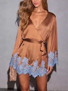 Elegant brown satin wrap mini dress with blue lace trim and a tie waist