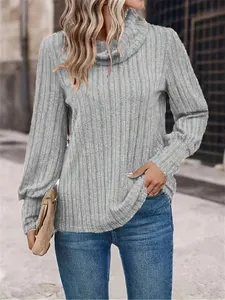 Detailed view of the ribbed texture and soft cowl neck on this grey long sleeve top.