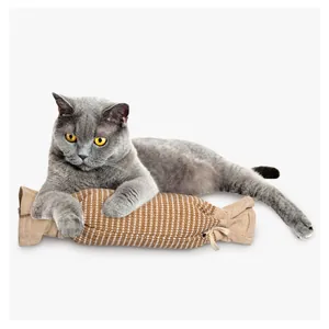 Detailed view of candy-shaped jute cat toy with checkered pattern and durable texture