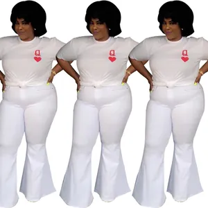 Full view of white slim fit flared bell-bottom pants with ruffle hem for women