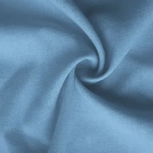 Makro-Detailansicht des weichen blauen Baumwoll-Leinen-Stoffs mit feiner Webstruktur