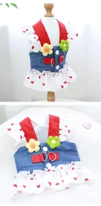 Detail view of pet harness dress with denim vest, floral accents, and heart pattern
