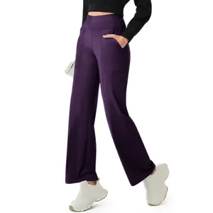 Close-up of high-waisted purple yoga pants featuring functional pockets and straight-leg fit