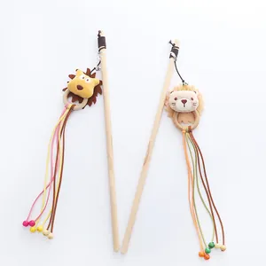 Interactive wooden cat teaser wand featuring plush lion head ribbons and small bells