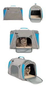 Collapsible grey and blue pet carrier bag with breathable mesh and soft interior pad.