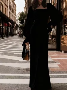 Elegant black long-sleeved slim-fit fishtail evening gown for the formal events