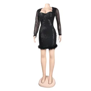 Front view of black sequined long-sleeve mini dress with feather hem on mannequin