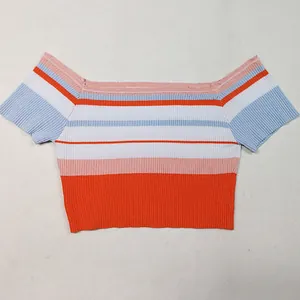 Close-up detail of a colorful striped off-the-shoulder ribbed knit crop top for women