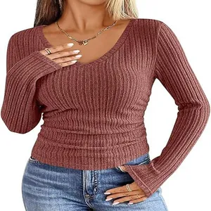 Detail of a slim fit V-neck long sleeve t-shirt in terracotta brushed ribbed fabric