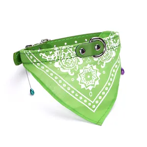 Detail of green paisley pet bandana collar with adjustable PU strap and metal buckle