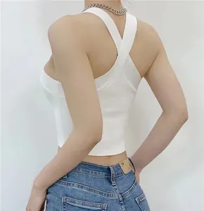 Sexy white knitted halter crop top with criss-cross back straps shown from the back
