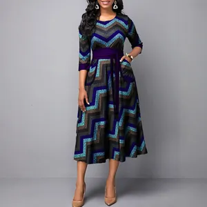 Elegant plus size round neck chevron print dress with high waist tie belt and pockets