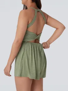 Elegant green sleeveless backless romper for women featuring twist detail and elastic waist