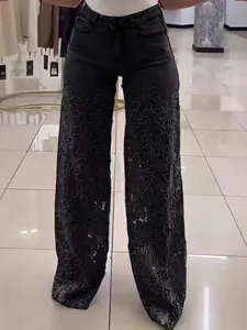 Women's trendy dark grey wide-leg jeans featuring intricate floral lace patchwork detail