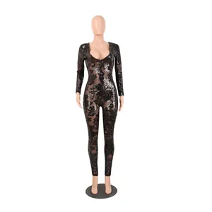 Body glamour in mesh trasparente con paillettes nere, scollo a V profondo e motivi floreali