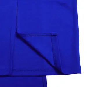 Macro view of professional stitching and double-needle hem on a royal blue garment