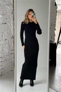 Elegant black long sleeve ribbed knit bodycon maxi dress with a classic crew neck.