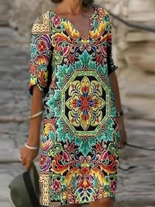 Boho vintage printed V-neck knee-length dress with colorful abstract patterns and half sleeves
