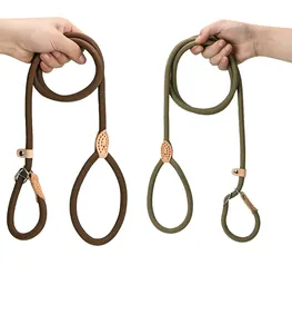 Detail showing heavy-duty braided rope slip leads for dogs with durable leather stoppers