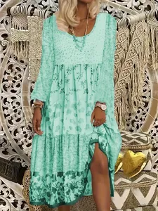 Full detail view of bohemian mint green long-sleeved floral printed maxi dress
