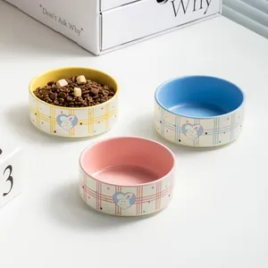Set of three ceramic pet bowls for cats and dogs with cute rabbit print and anti-tip design