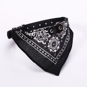 Detailed close-up view of black pet bandana collar featuring a white paisley pattern