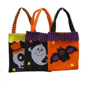 Set of three Halloween non-woven candy gift bags with ghost, skeleton, and bat designs