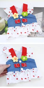 Detailed view of cute denim pet harness dress with heart patterns and flower accents
