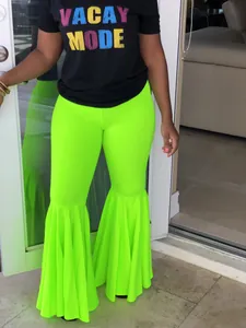 Pantalones de campana con volantes verde neón vibrante para looks sexys de discoteca