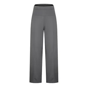 Detailed view of grey high-waisted straight leg yoga pants featuring functional side pockets
