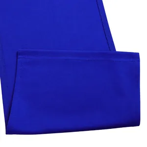 Close-up of royal blue dress hem showing high-quality double stitching detail.