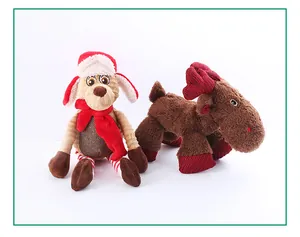 Detailed view of festive Christmas moose and dog plush pet toys on white background