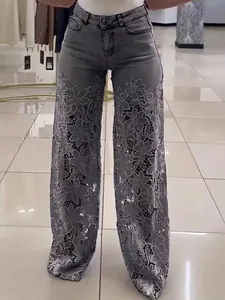 Women's high-waisted wide-leg grey denim jeans with elegant floral lace patchwork