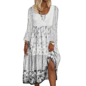 Women's long-sleeved bohemian floral print tiered maxi dress with a round neck line