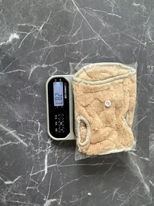 Lightweight beige plush winter pet vest for small dogs, detail showing weight 28.7g