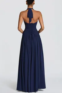 Elegant back view of navy blue halter maxi dress featuring corset lace-up detailing