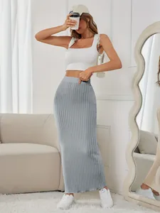 Macro view of the grey ribbed knit fabric on this elegant high waisted midi skirt