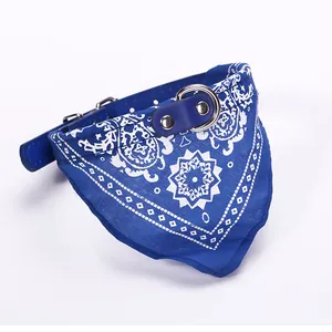 Blue pet bandana collar with white paisley patterns and durable metal hardware details.